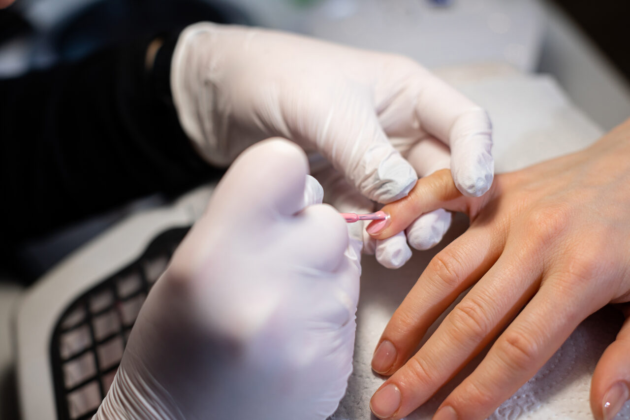 The,Beautician,Paints,The,Nail,Of,The,Client’s,Little,Finger.